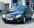 Черный Киа Черато, объемом двигателя 2 л и пробегом 187 тыс. км за 3300 $, фото 1 на Automoto.ua