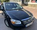 Чорний Кіа Черато, об'ємом двигуна 1.6 л та пробігом 106 тис. км за 5300 $, фото 19 на Automoto.ua