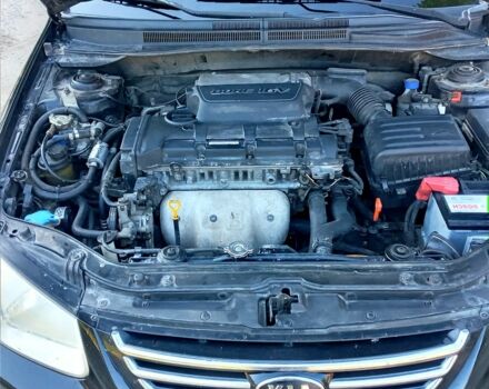 Чорний Кіа Черато, об'ємом двигуна 2 л та пробігом 203 тис. км за 5500 $, фото 4 на Automoto.ua