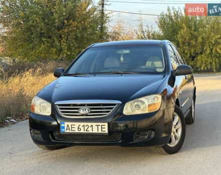 Черный Киа Черато, объемом двигателя 1.6 л и пробегом 235 тыс. км за 4900 $, фото 1 на Automoto.ua