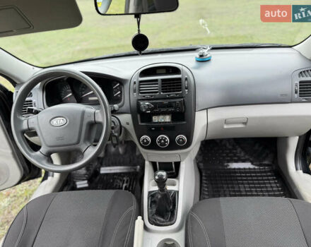 Черный Киа Черато, объемом двигателя 1.59 л и пробегом 312 тыс. км за 3000 $, фото 13 на Automoto.ua