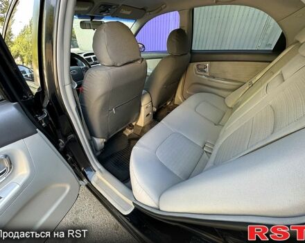 Киа Черато 2007 в Николаеве на Automoto.ua Черный Киа Черато, объемом двигателя 2 л и пробегом 257 тыс. км за 5350 $, фото 9 на Automoto.ua