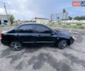 Чорний Кіа Черато, об'ємом двигуна 1.6 л та пробігом 337 тис. км за 5000 $, фото 2 на Automoto.ua