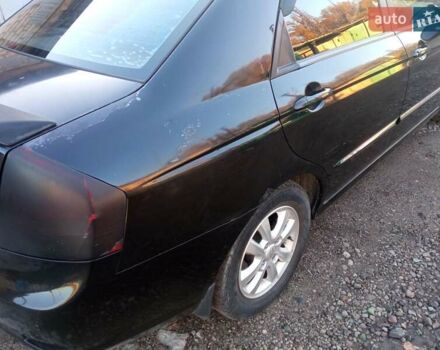 Черный Киа Черато, объемом двигателя 1.6 л и пробегом 228 тыс. км за 4300 $, фото 3 на Automoto.ua