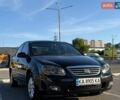Черный Киа Черато, объемом двигателя 1.59 л и пробегом 212 тыс. км за 3599 $, фото 1 на Automoto.ua