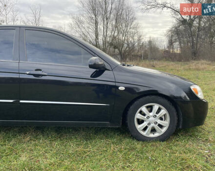 Черный Киа Черато, объемом двигателя 1.98 л и пробегом 315 тыс. км за 5745 $, фото 5 на Automoto.ua