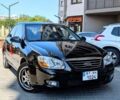 Чорний Кіа Черато, об'ємом двигуна 2 л та пробігом 283 тис. км за 6000 $, фото 1 на Automoto.ua