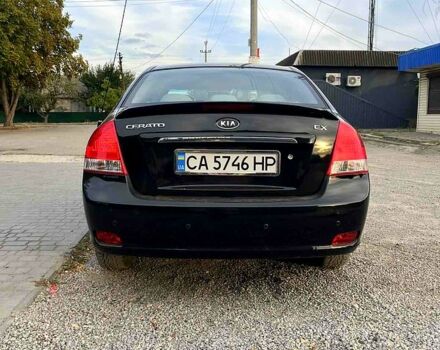 Черный Киа Черато, объемом двигателя 2 л и пробегом 186 тыс. км за 5300 $, фото 2 на Automoto.ua