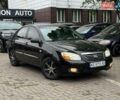 Черный Киа Черато, объемом двигателя 1.59 л и пробегом 286 тыс. км за 3500 $, фото 1 на Automoto.ua