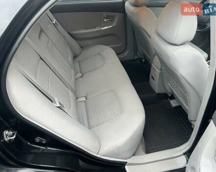 Черный Киа Черато, объемом двигателя 1.6 л и пробегом 180 тыс. км за 4900 $, фото 7 на Automoto.ua