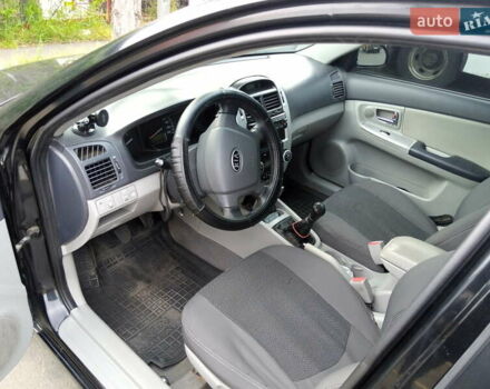 Черный Киа Черато, объемом двигателя 1.59 л и пробегом 223 тыс. км за 4400 $, фото 4 на Automoto.ua