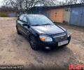 Черный Киа Черато, объемом двигателя 1.6 л и пробегом 201 тыс. км за 4500 $, фото 1 на Automoto.ua