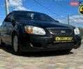 Чорний Кіа Черато, об'ємом двигуна 1.6 л та пробігом 320 тис. км за 4400 $, фото 1 на Automoto.ua