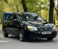 Черный Киа Черато, объемом двигателя 1.6 л и пробегом 310 тыс. км за 3600 $, фото 1 на Automoto.ua