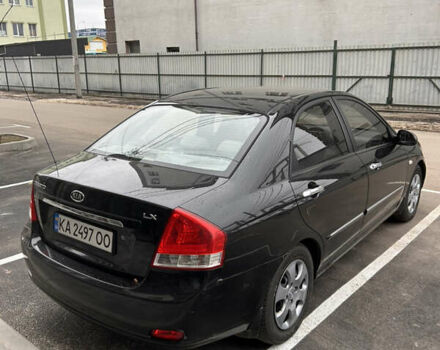 Черный Киа Черато, объемом двигателя 1.6 л и пробегом 206 тыс. км за 4500 $, фото 4 на Automoto.ua