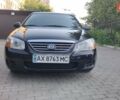 Чорний Кіа Черато, об'ємом двигуна 1.6 л та пробігом 204 тис. км за 4900 $, фото 10 на Automoto.ua
