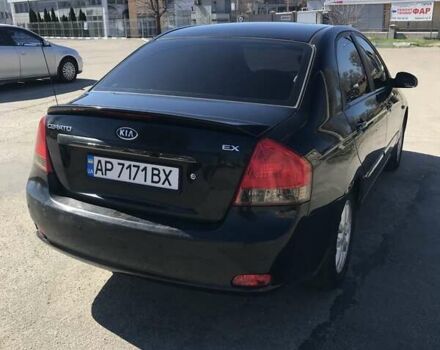 Черный Киа Черато, объемом двигателя 2 л и пробегом 232 тыс. км за 4500 $, фото 4 на Automoto.ua