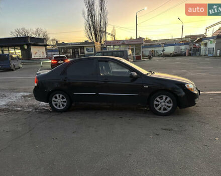 Черный Киа Черато, объемом двигателя 1.6 л и пробегом 294 тыс. км за 3500 $, фото 1 на Automoto.ua