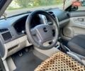 Чорний Кіа Черато, об'ємом двигуна 1.6 л та пробігом 111 тис. км за 4200 $, фото 6 на Automoto.ua