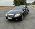 Чорний Кіа Черато, об'ємом двигуна 1.6 л та пробігом 160 тис. км за 5500 $, фото 1 на Automoto.ua