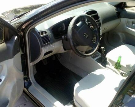 Черный Киа Черато, объемом двигателя 2 л и пробегом 240 тыс. км за 4700 $, фото 2 на Automoto.ua