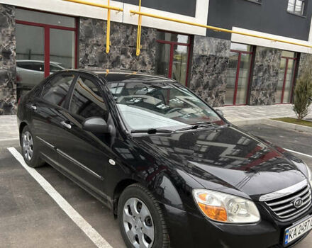 Черный Киа Черато, объемом двигателя 1.6 л и пробегом 206 тыс. км за 4500 $, фото 1 на Automoto.ua