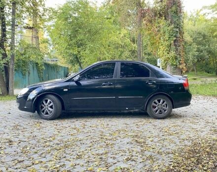 Черный Киа Черато, объемом двигателя 2 л и пробегом 302 тыс. км за 4600 $, фото 3 на Automoto.ua