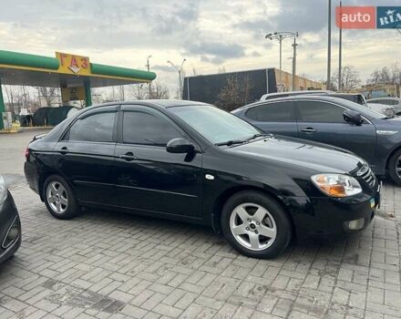 Черный Киа Черато, объемом двигателя 1.6 л и пробегом 180 тыс. км за 4900 $, фото 11 на Automoto.ua