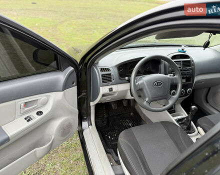 Черный Киа Черато, объемом двигателя 1.59 л и пробегом 312 тыс. км за 3000 $, фото 8 на Automoto.ua