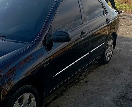 Черный Киа Черато, объемом двигателя 1.6 л и пробегом 221 тыс. км за 4500 $, фото 5 на Automoto.ua