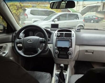 Черный Киа Черато, объемом двигателя 1.98 л и пробегом 180 тыс. км за 4500 $, фото 14 на Automoto.ua