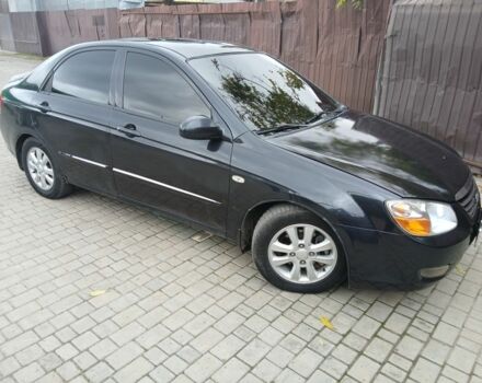 Черный Киа Черато, объемом двигателя 2 л и пробегом 250 тыс. км за 3700 $, фото 1 на Automoto.ua