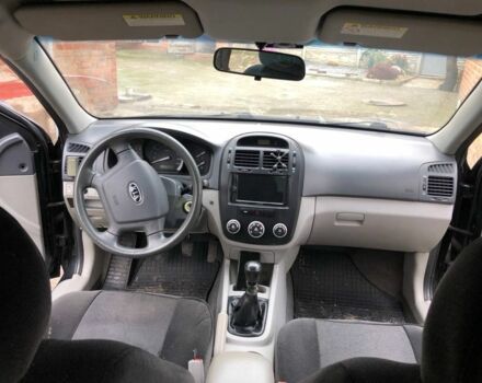 Черный Киа Черато, объемом двигателя 1.6 л и пробегом 240 тыс. км за 3300 $, фото 12 на Automoto.ua