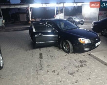 Черный Киа Черато, объемом двигателя 2 л и пробегом 340 тыс. км за 5500 $, фото 5 на Automoto.ua