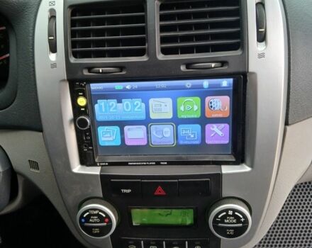 Черный Киа Черато, объемом двигателя 2 л и пробегом 250 тыс. км за 3700 $, фото 12 на Automoto.ua