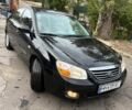 Черный Киа Черато, объемом двигателя 2 л и пробегом 250 тыс. км за 5000 $, фото 1 на Automoto.ua