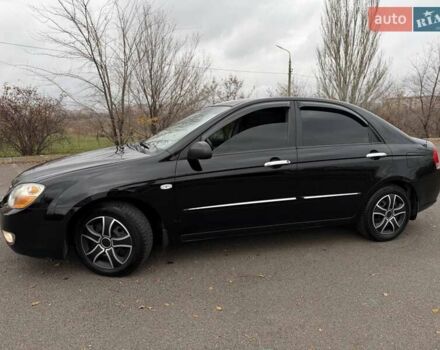 Чорний Кіа Черато, об'ємом двигуна 1.6 л та пробігом 224 тис. км за 4900 $, фото 9 на Automoto.ua