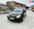 Черный Киа Черато, объемом двигателя 1.6 л и пробегом 95 тыс. км за 2999 $, фото 1 на Automoto.ua