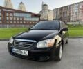 Чорний Кіа Черато, об'ємом двигуна 1.6 л та пробігом 220 тис. км за 4200 $, фото 1 на Automoto.ua