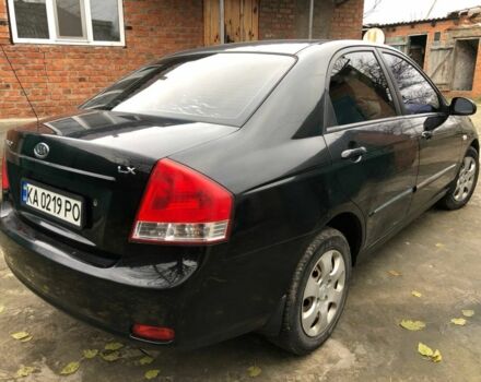 Черный Киа Черато, объемом двигателя 1.6 л и пробегом 240 тыс. км за 3300 $, фото 6 на Automoto.ua