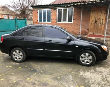 Черный Киа Черато, объемом двигателя 1.6 л и пробегом 240 тыс. км за 3300 $, фото 7 на Automoto.ua