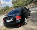 Чорний Кіа Черато, об'ємом двигуна 1.6 л та пробігом 157 тис. км за 5800 $, фото 5 на Automoto.ua
