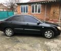 Черный Киа Черато, объемом двигателя 1.6 л и пробегом 240 тыс. км за 3300 $, фото 7 на Automoto.ua