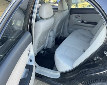 Чорний Кіа Черато, об'ємом двигуна 2 л та пробігом 362 тис. км за 3900 $, фото 6 на Automoto.ua