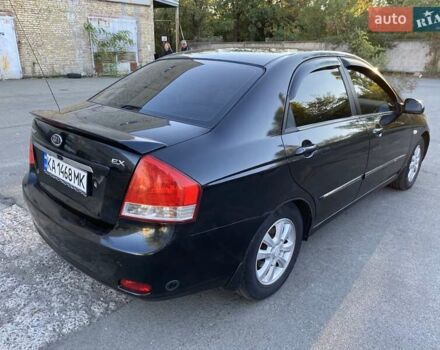 Черный Киа Черато, объемом двигателя 1.98 л и пробегом 335 тыс. км за 4100 $, фото 5 на Automoto.ua