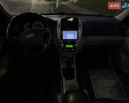 Черный Киа Черато, объемом двигателя 1.6 л и пробегом 294 тыс. км за 3500 $, фото 8 на Automoto.ua
