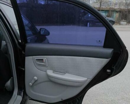 Чорний Кіа Черато, об'ємом двигуна 1.59 л та пробігом 300 тис. км за 4550 $, фото 26 на Automoto.ua