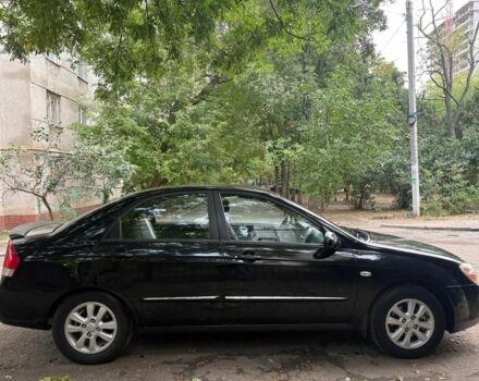 Черный Киа Черато, объемом двигателя 2 л и пробегом 250 тыс. км за 5000 $, фото 2 на Automoto.ua