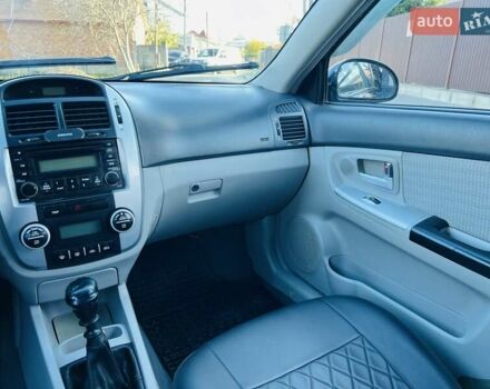 Черный Киа Черато, объемом двигателя 1.6 л и пробегом 210 тыс. км за 3650 $, фото 47 на Automoto.ua