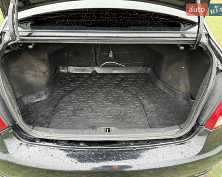 Черный Киа Черато, объемом двигателя 1.59 л и пробегом 312 тыс. км за 3000 $, фото 11 на Automoto.ua